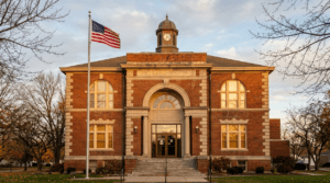 Image of Generic Ohio City Hall building, red brick, American flag