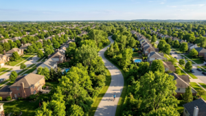 birds eye view of hilliard ohio street. lots of trees and a biker